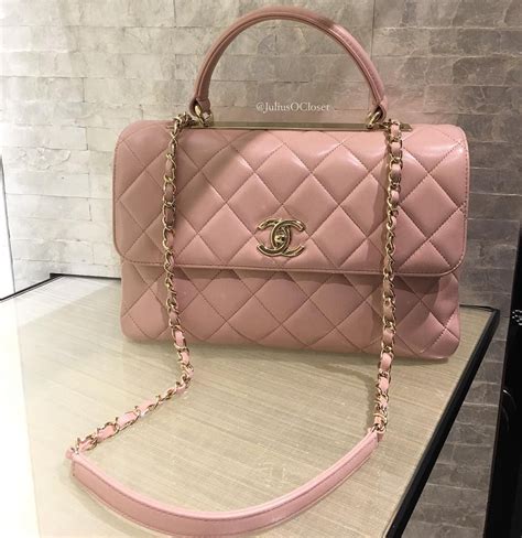 women pink chanel bag